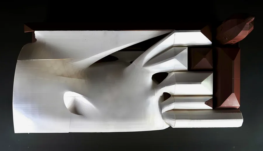 Top view of sectional model highlighting the transition between the design and the market