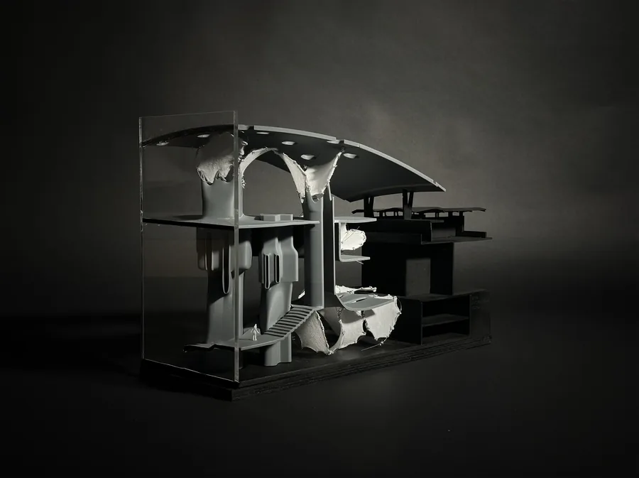 1:100 sectional model demonstrating the spatial and material relationship between flexible and rigid structural elements.